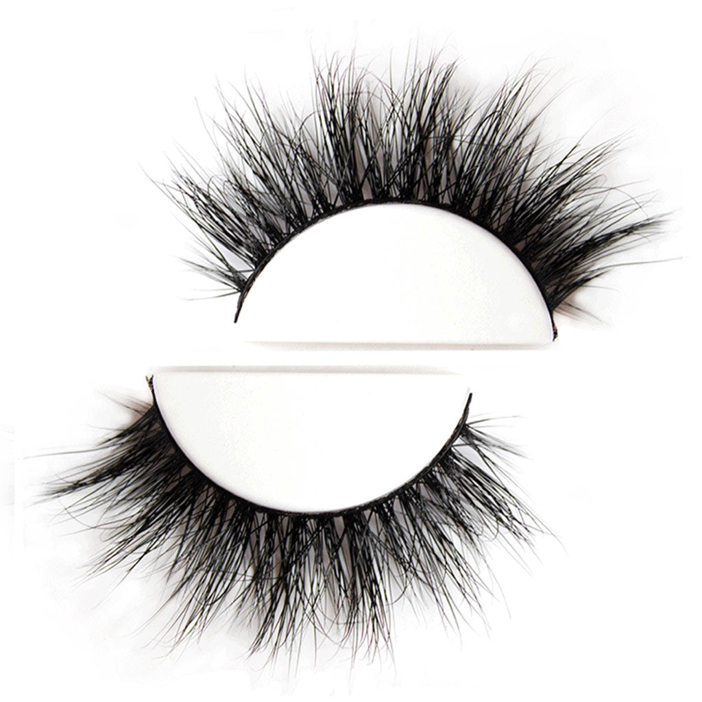 Genele false de lux 'Rolling Stone' de la Mink Lash, cu design dramatic și volum 3D, prezentate în ambalajul lor premium, negru.